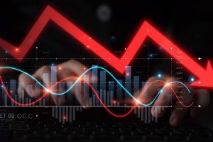 An up-and-down red arrow alongside a fluctuating bar graph and other symbols of volatility