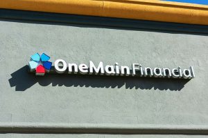 The logo of OneMain Financial on the side of a building