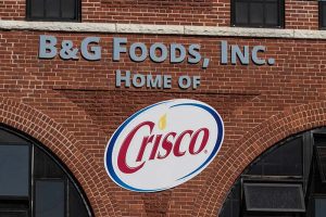 A brick building with “B&G Foods, Inc., home of Crisco” written on the side