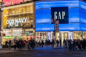 A Gap store on a busy street corner