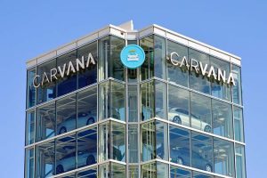 A Carvana vending tower with the company’s logo on it