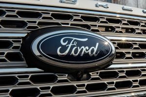 The Ford logo on the front of a truck