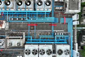 An overhead view of cooling towers on the roof of a data center