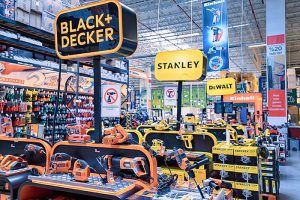 Power tools made by Stanley, Black & Decker, and DeWalt inside a store