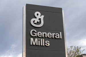 “General Mills” and the company logo on a sign outside a building