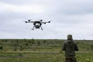 A soldier controlling a military drone