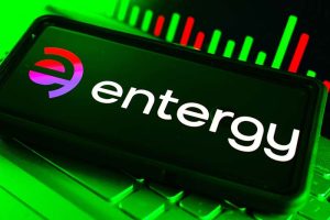 The Entergy logo on a smartphone