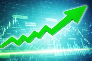 A bold, green arrow in front of several stock charts on a blue background