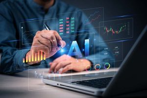 A person sitting at their desk with the word “AI” and several charts hovering over their laptop