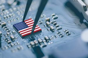 An American flag-colored microchip on a motherboard