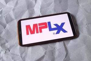 The MPLX logo on a smartphone on a gray background