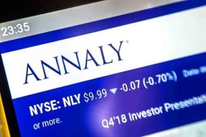 A computer screen showing the Annaly Capital logo, ticker symbol, exchange, and price