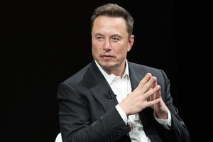 A photo of Elon Musk at a conference