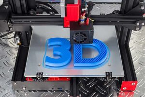 A 3D printer creating the word “3D”